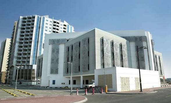 UAE Olympic Committee headquarters, Dubai — white perforated façade.